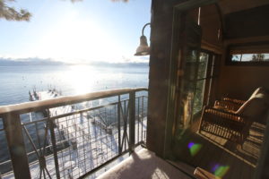 The view from the deck in West Shore Cafe and Inn's Marlette Room shows Lake Tahoe and snow covered peaks.
