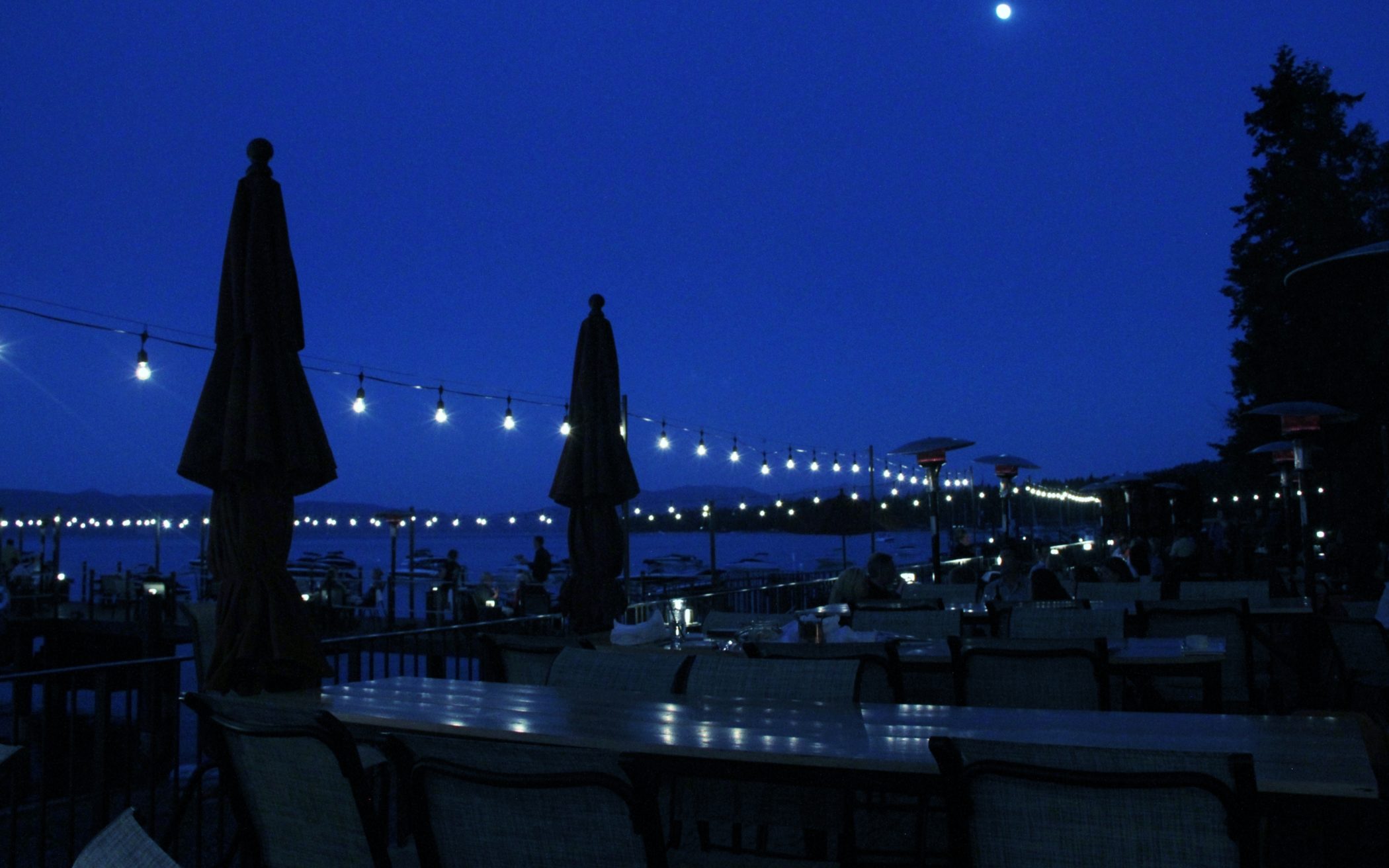 Dining past dusk under the moonlight