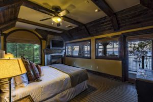 The Mount Watson Suite Bedroom features views of Lake Tahoe.