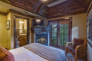 The bedroom in Sugar Pine Point Suite at West Shore Cafe and inn