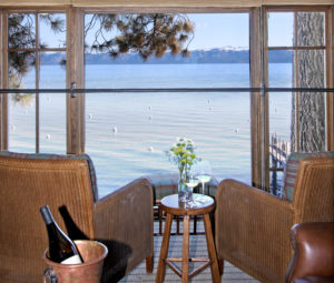 The view from Watson Room at West Shore Cafe and Inn shows Lake Tahoe and Snow Covered Peaks